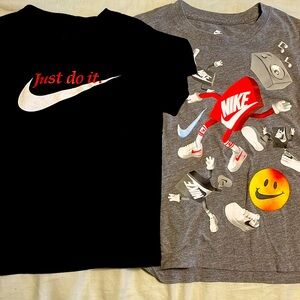 (2) Nike t shirts.